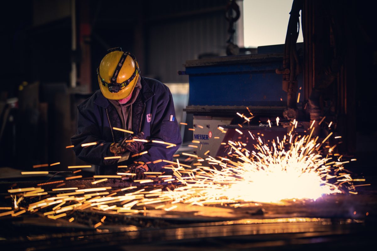 Expert steel cutting with sparks at Huntington Steel