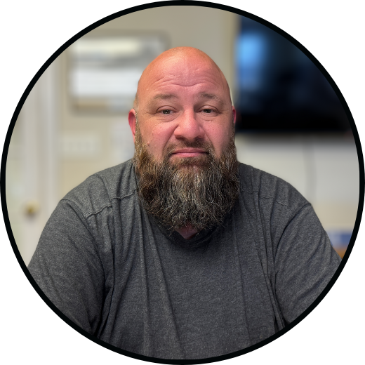 Circular framed portrait of Brent Layne, Fitter/Welder at Huntington Steel.